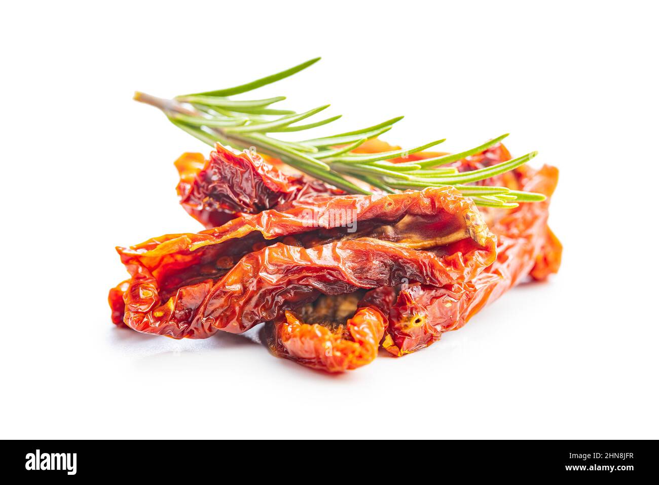 Sun dried tomatoes isolated on white background. Stock Photo
