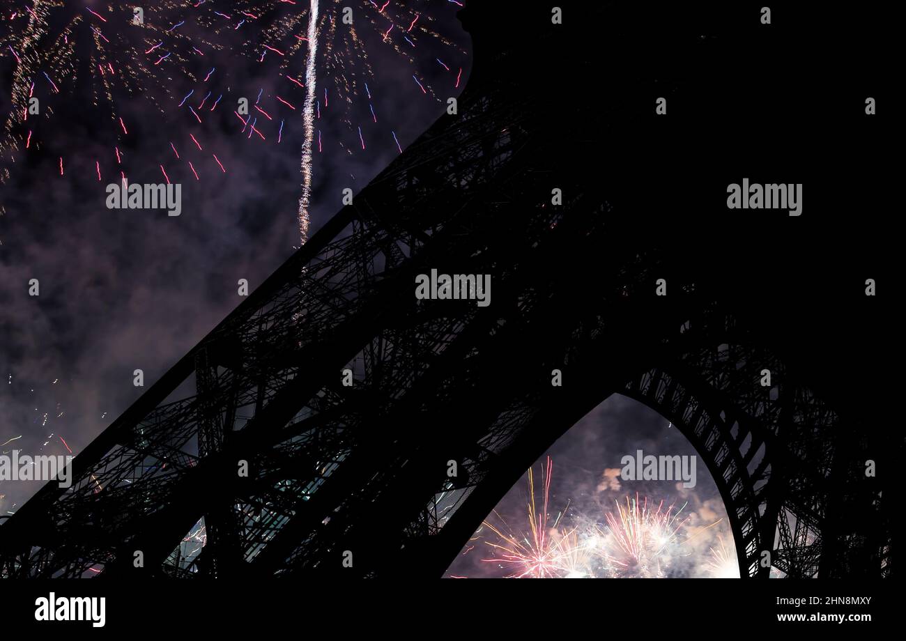 Celebratory colorful fireworks over the Eiffel Tower in Paris, France Stock Photo