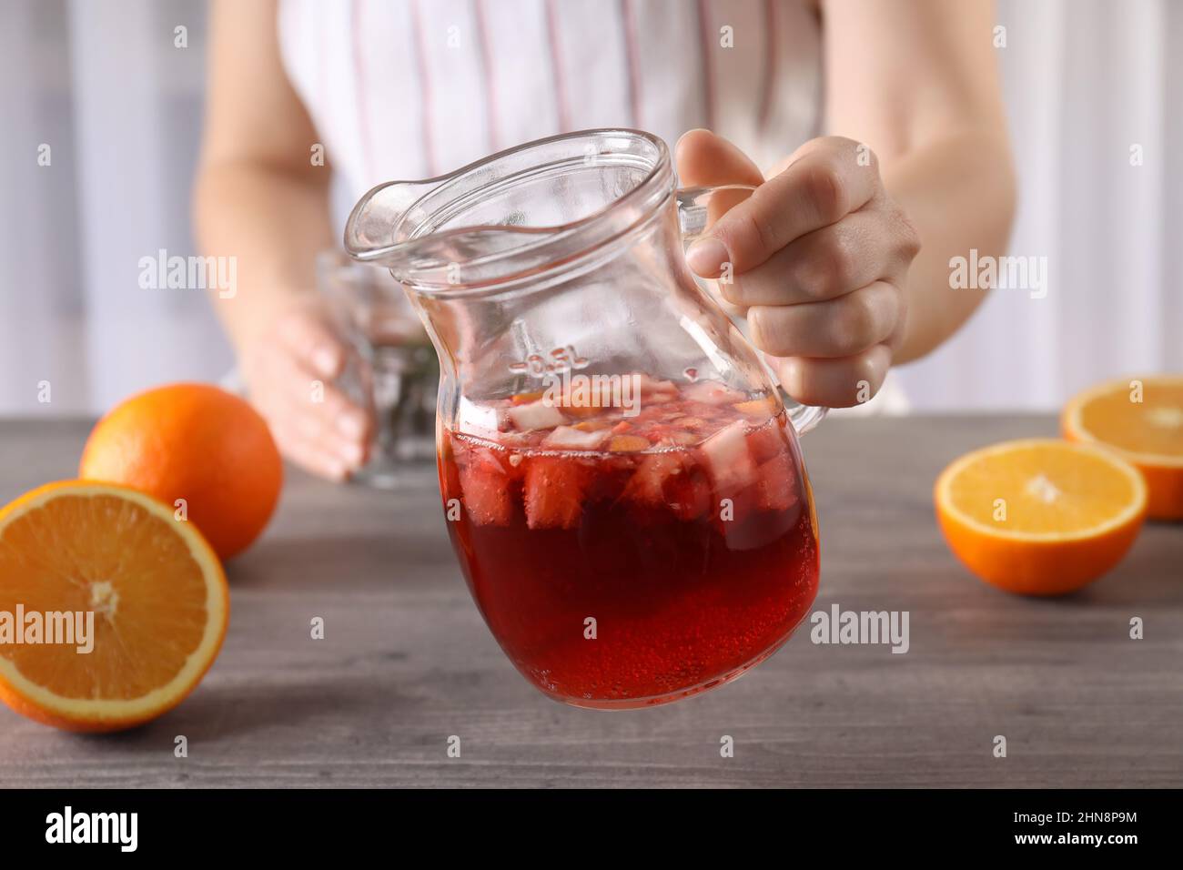 Sangria in a pitcher and in glasses Stock Photo - Alamy