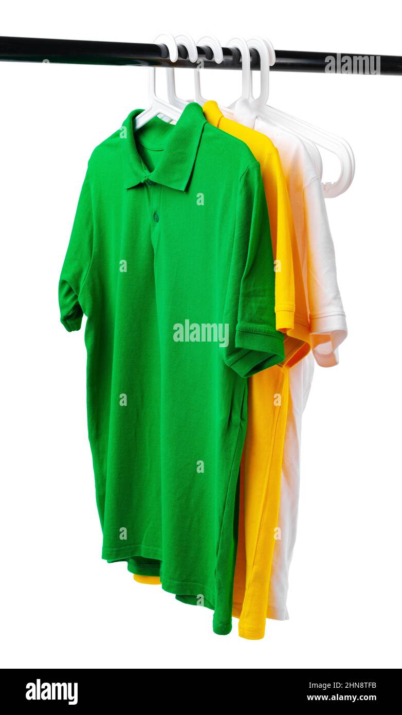 Clothes hang on clothing rack over white background Stock Photo Alamy