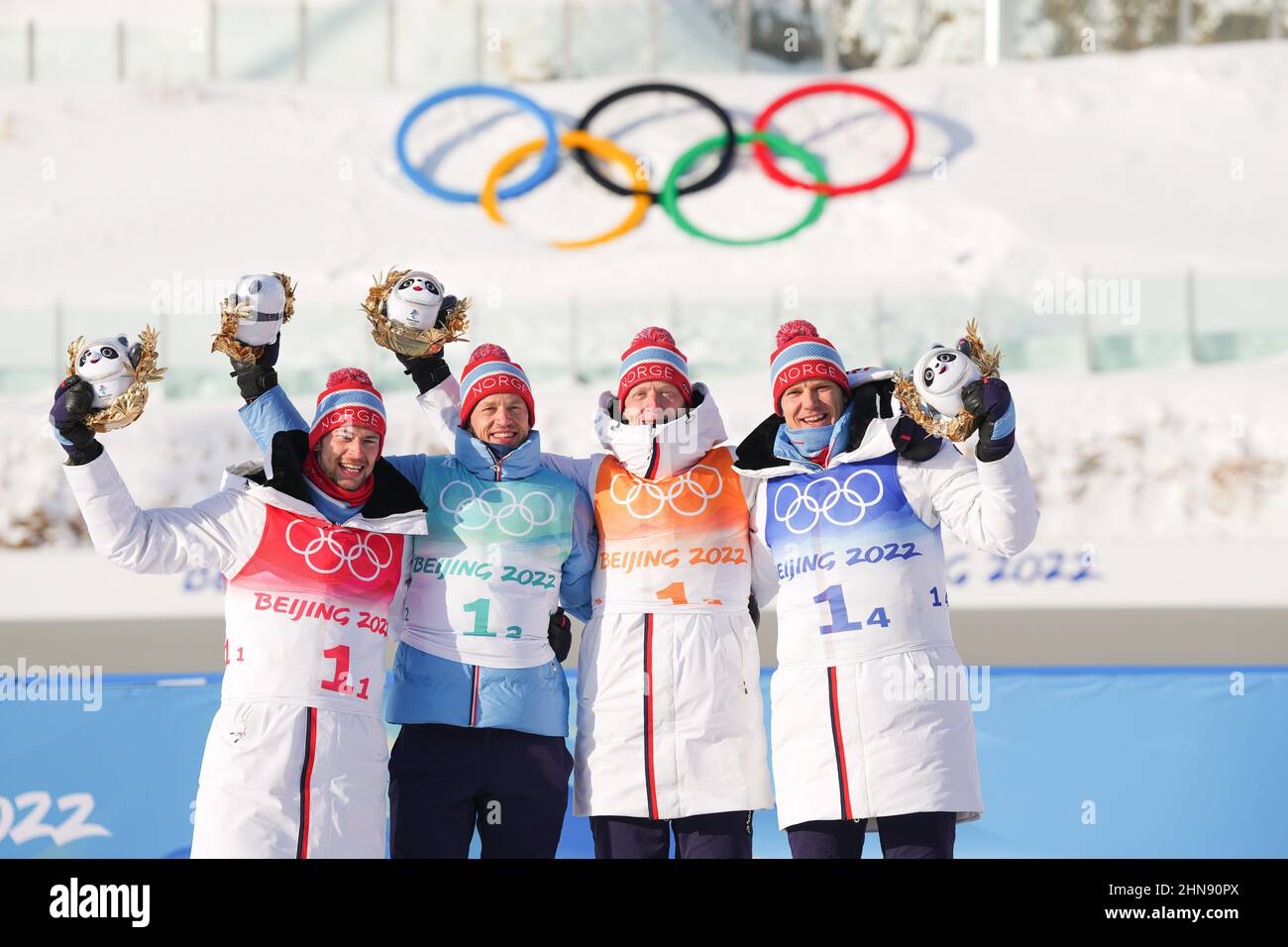 Zhangjiakou, China's Hebei Province. 15th Feb, 2022. Athletes of Norway pose for photos during the flower ceremony after biathlon men's 4x7.5km relay at National Biathlon Centre in Zhangjiakou, north China's Hebei Province, Feb. 15, 2022. Credit: Peng Ziyang/Xinhua/Alamy Live News Stock Photo