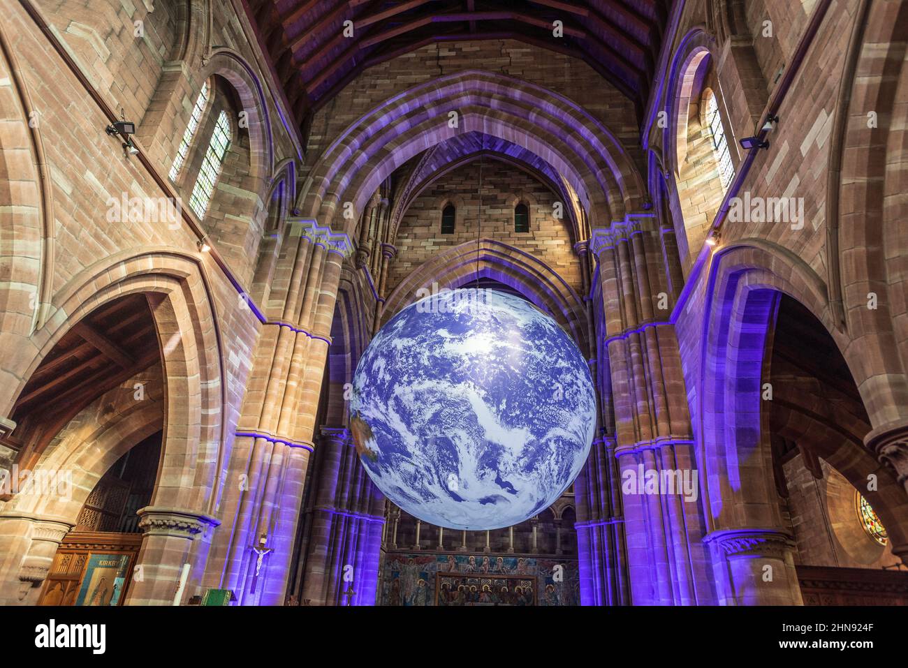 Gaia exhibition of planet eart at St. Chad's church in Kirkby, north west England on its tour of the world. The huge art installation 'Gaia', by artis Stock Photo