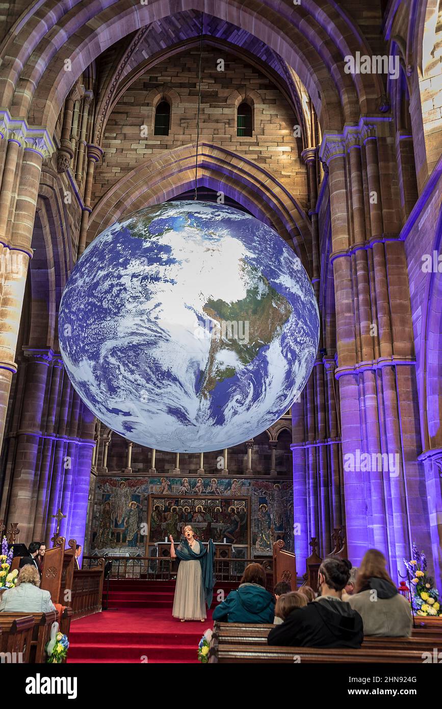 Gaia exhibition of planet eart at St. Chad's church in Kirkby, north west England on its tour of the world. The huge art installation 'Gaia', by artis Stock Photo