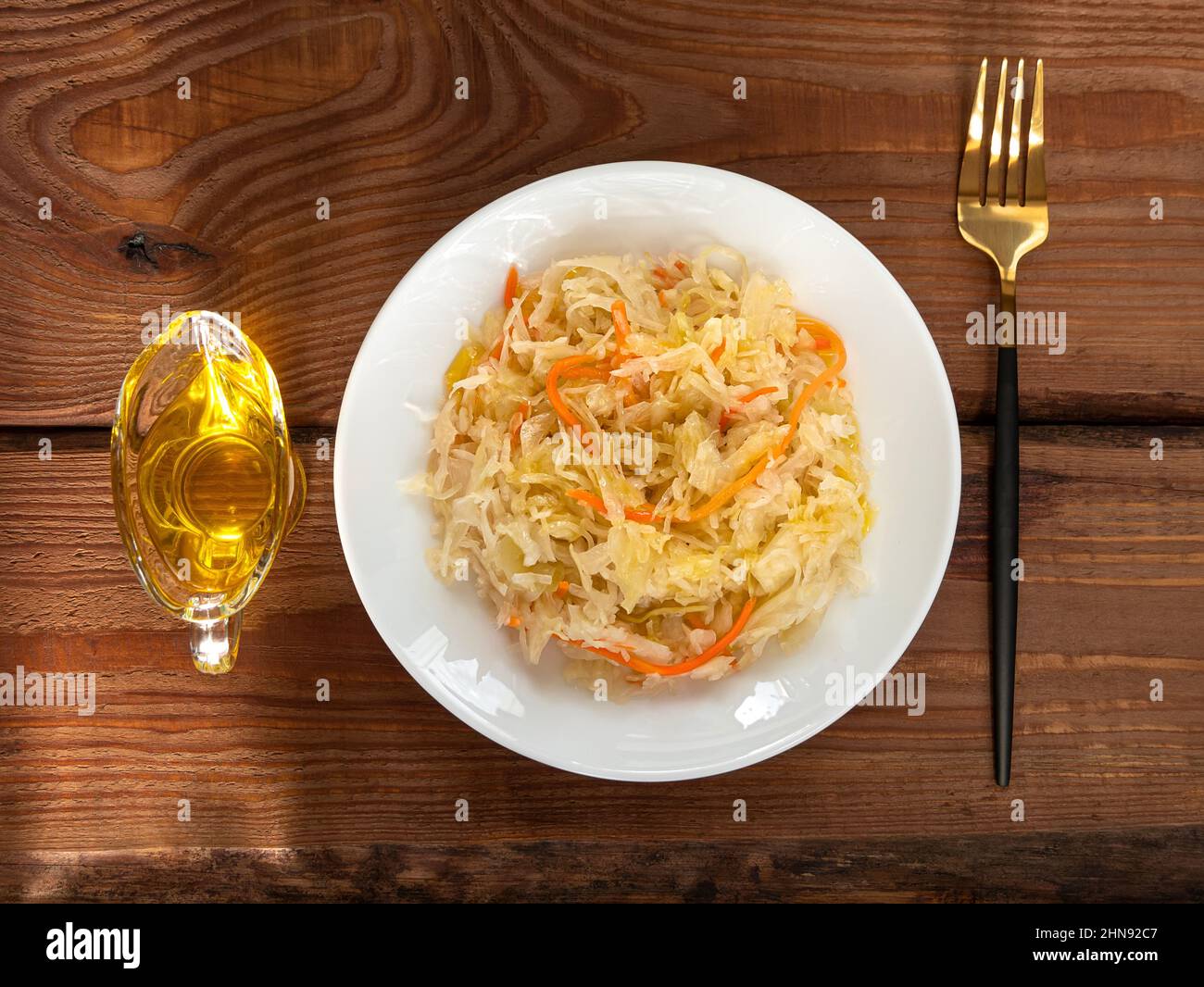 Eating Sauerkraut with vegetable oil. National european dish Pickled