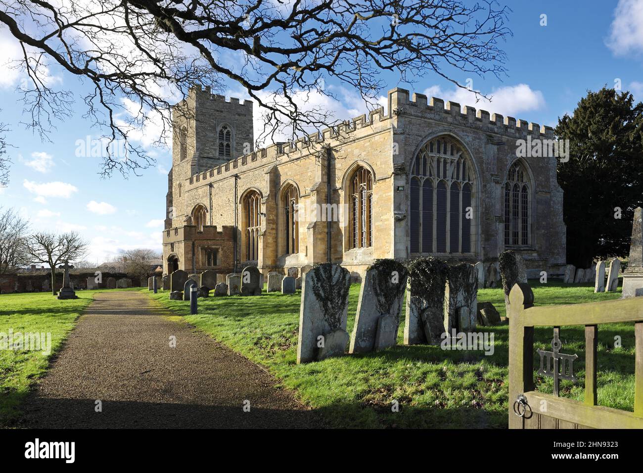 St Lawrence Church and churchyard, Willington, Bedfordshire, UK Stock Photo