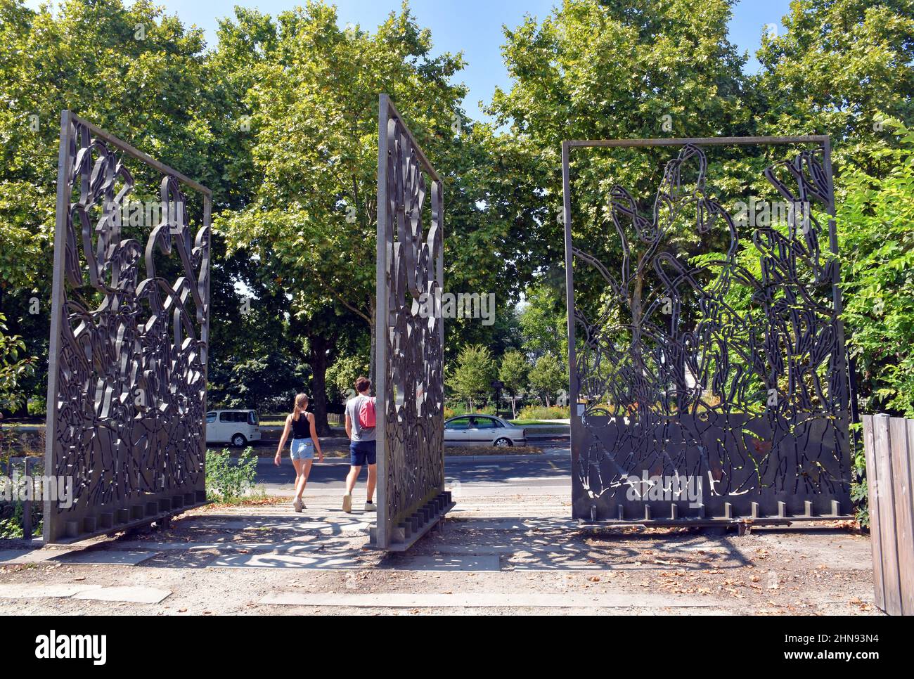 The main gate to the Jardin Botanique in Bordeaux, made of steel, with forms inspired by plants, painted dark blue -grey, made by Paul Convent Stock Photo