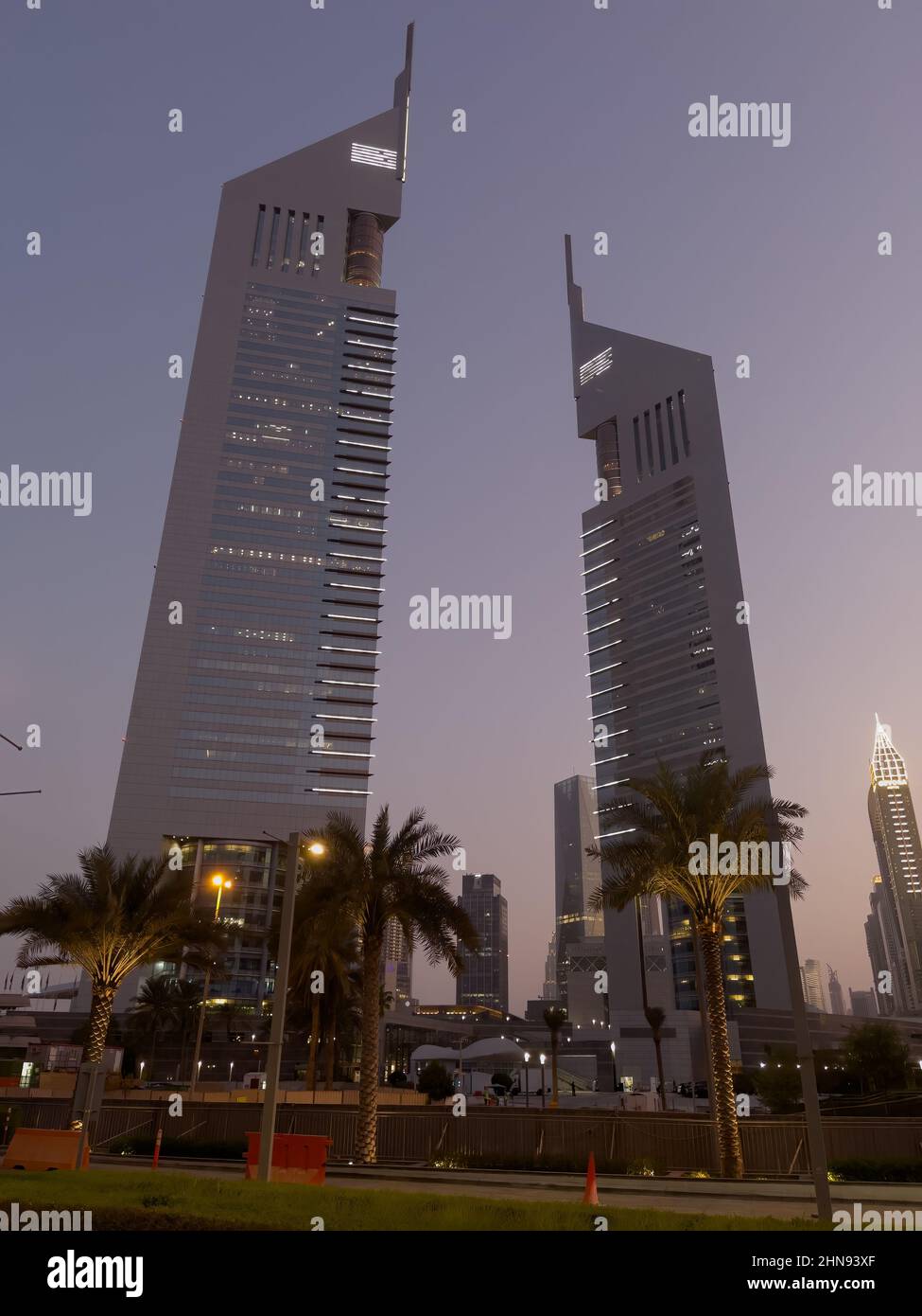 Dubai, United Arab Emirates - 3rd September, 2021 : View of the iconic Emirates Towers at dusk, designed by NORR Group Consultants International. Stock Photo