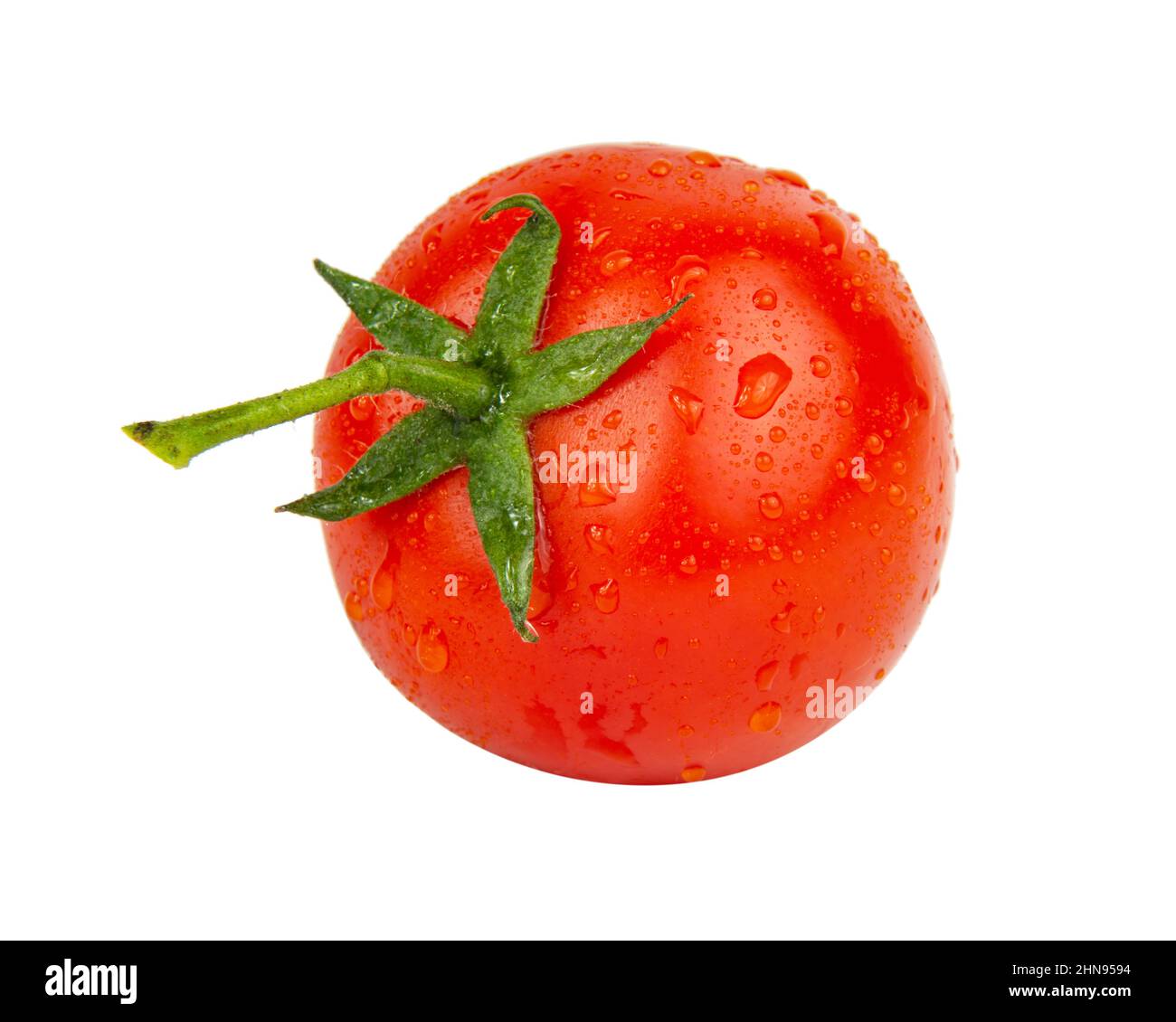 Fresh one red tomato with wet drops isolated on the white background ...