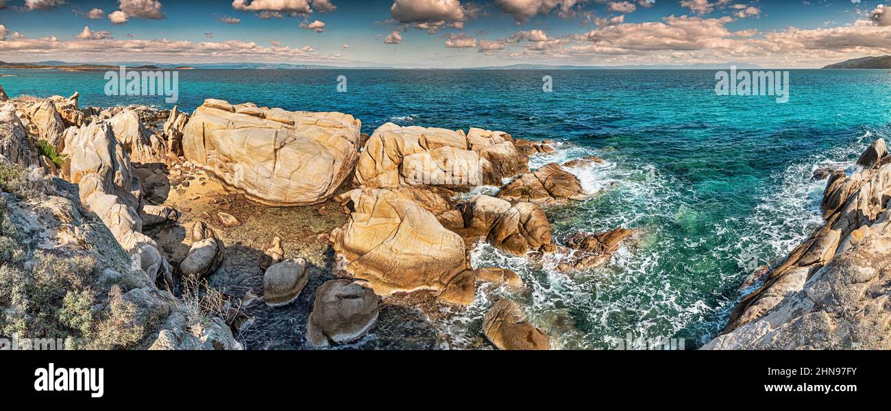 Panoramic view of scenic rocks and cliffs near the village of Vourvourou on the Sithonia Peninsula in the Halkidiki region. Visit iconic destinations Stock Photo