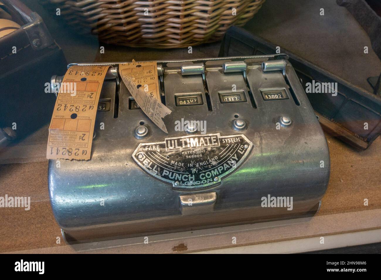A vinatge bus ticket machine ('Ultimate' by Bell Punch Co.) in the Streetlife Museum, Kingston Upon Hull, East Riding of Yorkshire, UK. Stock Photo