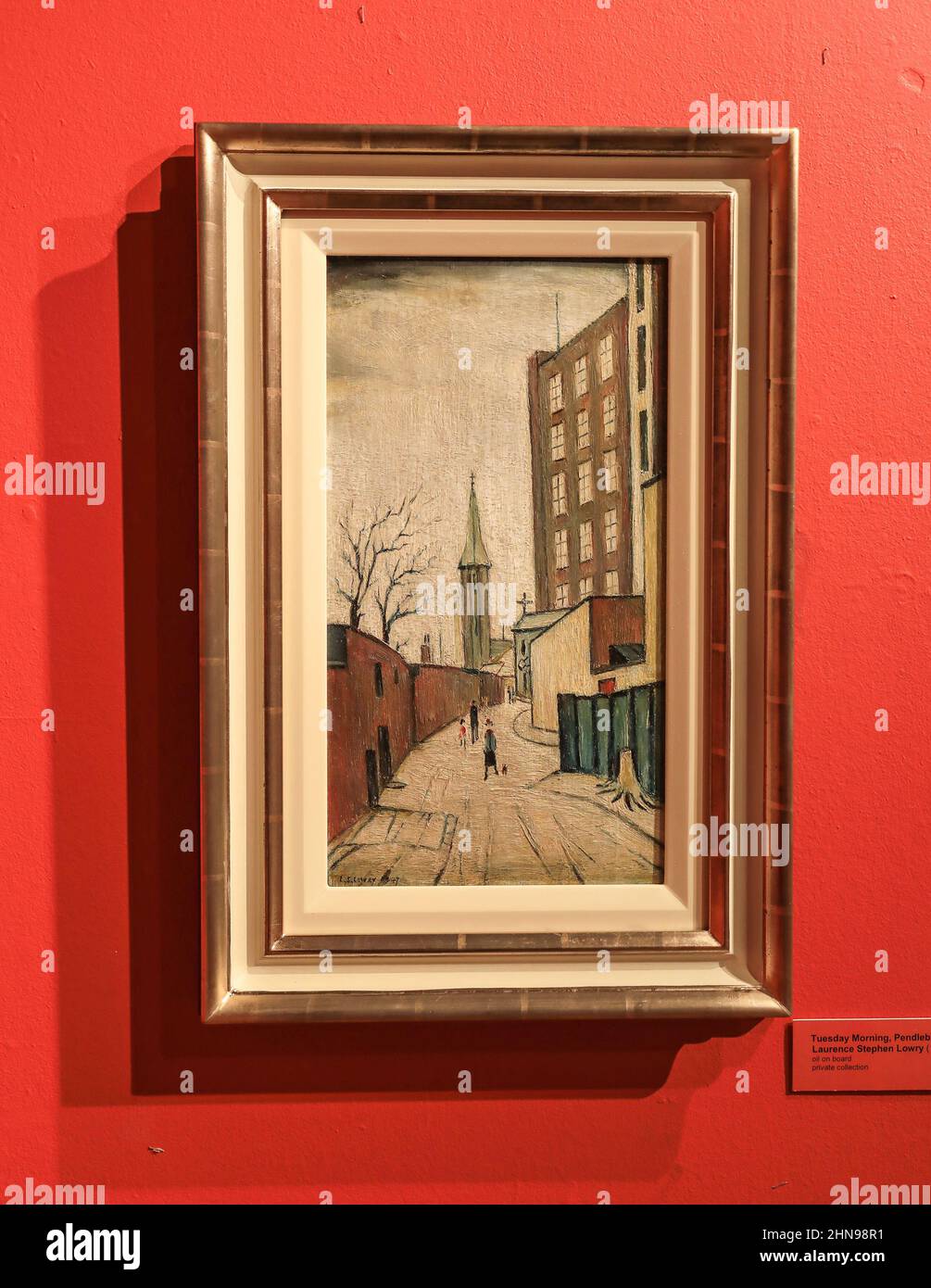 A picture called 'Tuesday Morning, Pendlebury' by L. S. Lowry at the Potteries Museum and Art Gallery, Hanley, Stoke-on-Trent, Staffs, England, UK Stock Photo