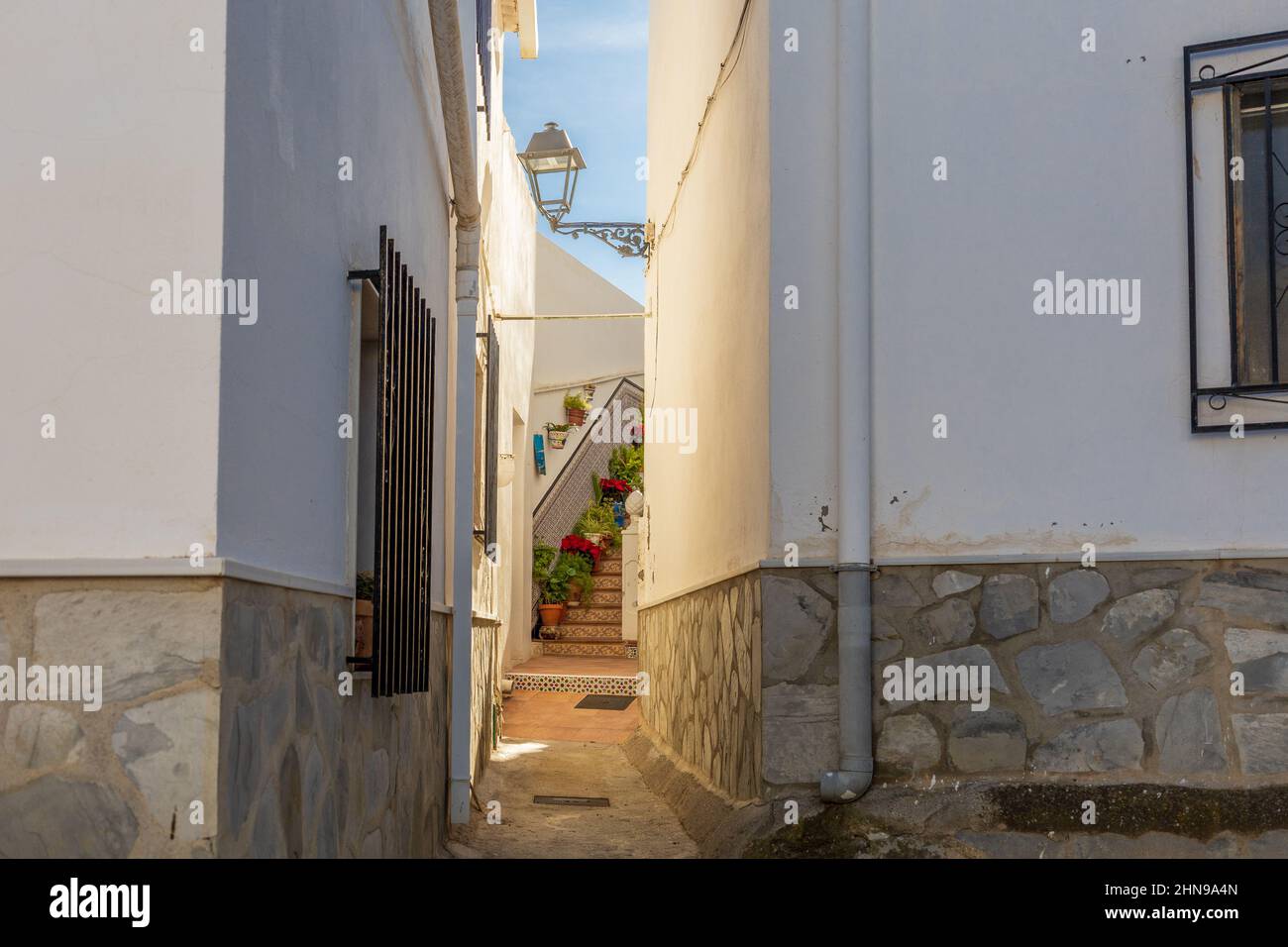 Narrow Passage between Houses leading to Stairs,  Arboleas Town, Almanzora Valley, Almeria province, Andalucía, Spain Stock Photo