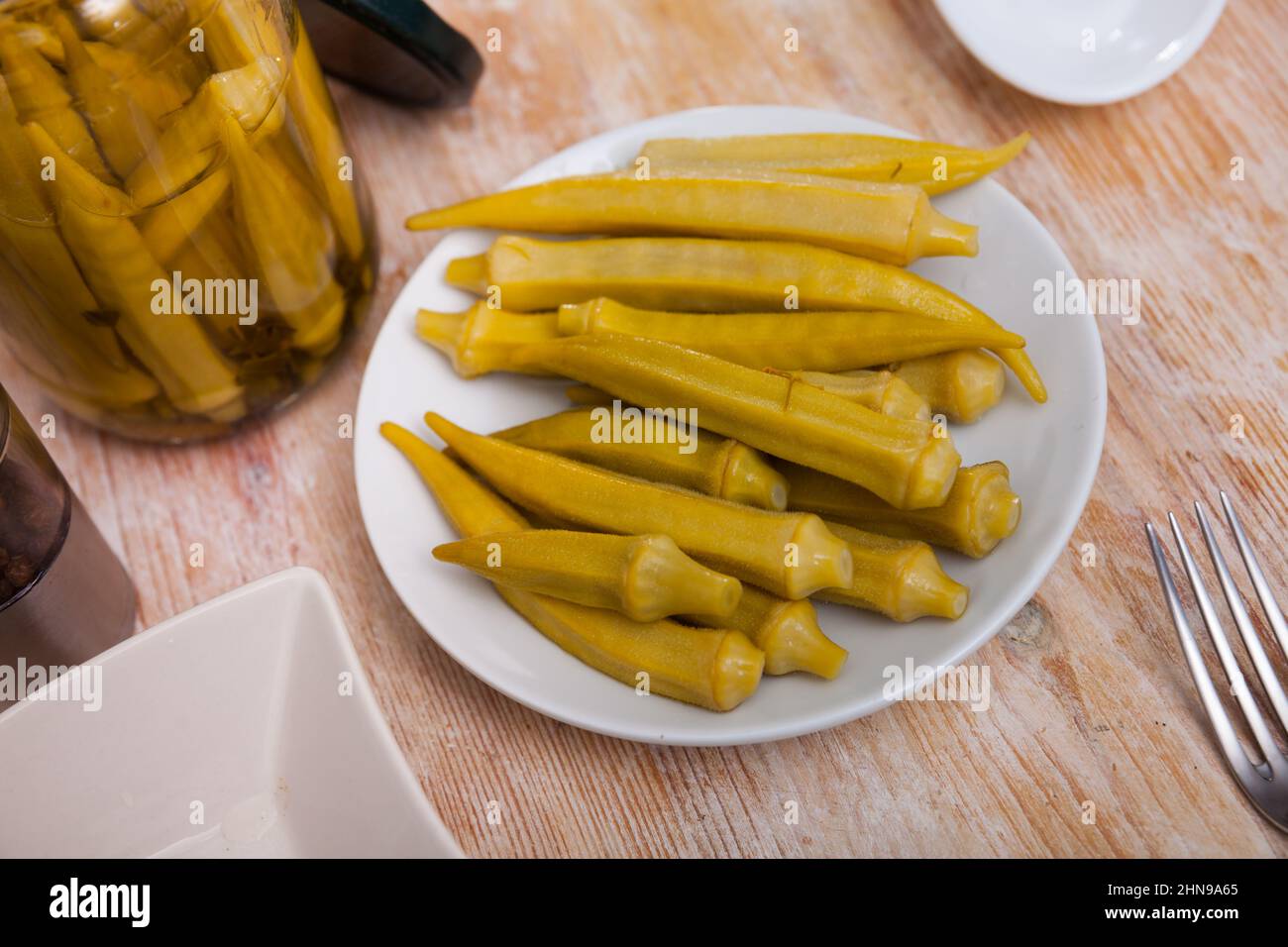 Homemade organic marinated pickled okra Stock Photo Alamy