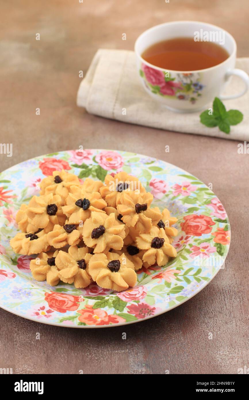 Kue Semprit, Indonesian Traditiona Cookies Served to Celebrate Lebaran Idul Fitri Ied Mubarak. Made from Butter, Flour, Egg, with Flower Shape. Served Stock Photo