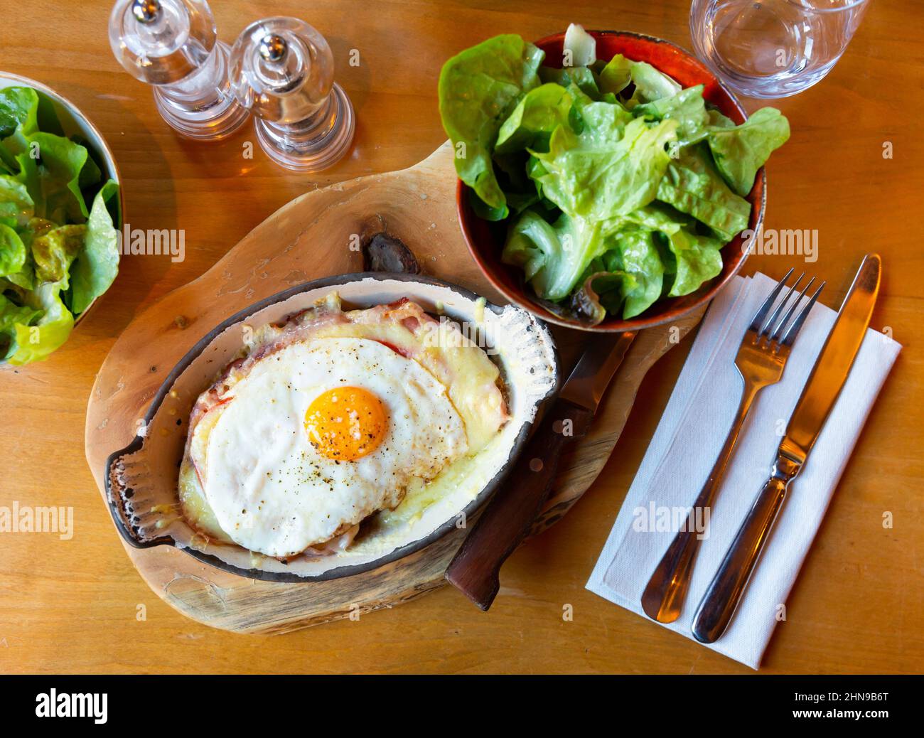 Swiss cheese crust with fried egg Stock Photo