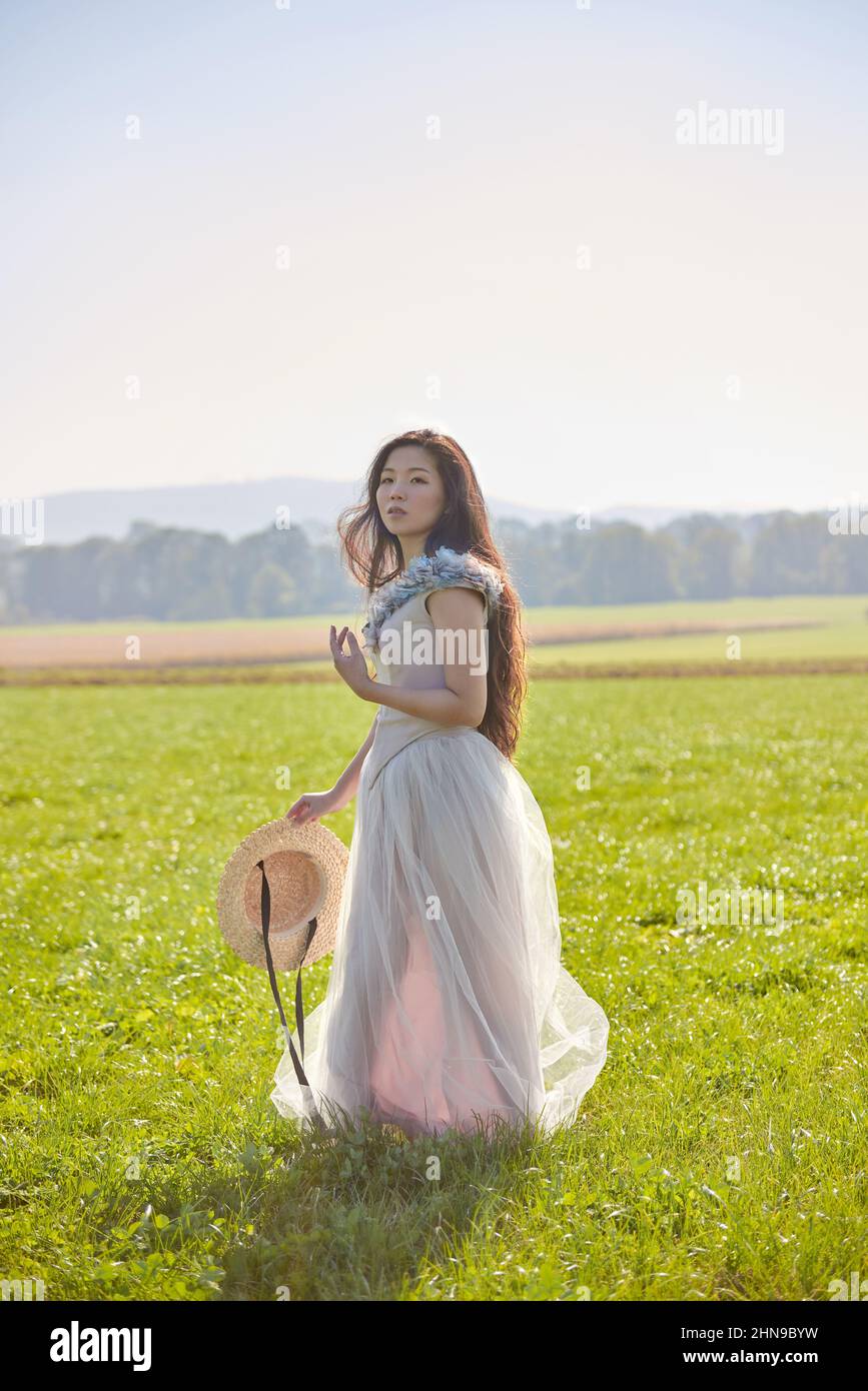 Walking barefoot grass asian hi-res stock photography and images - Alamy