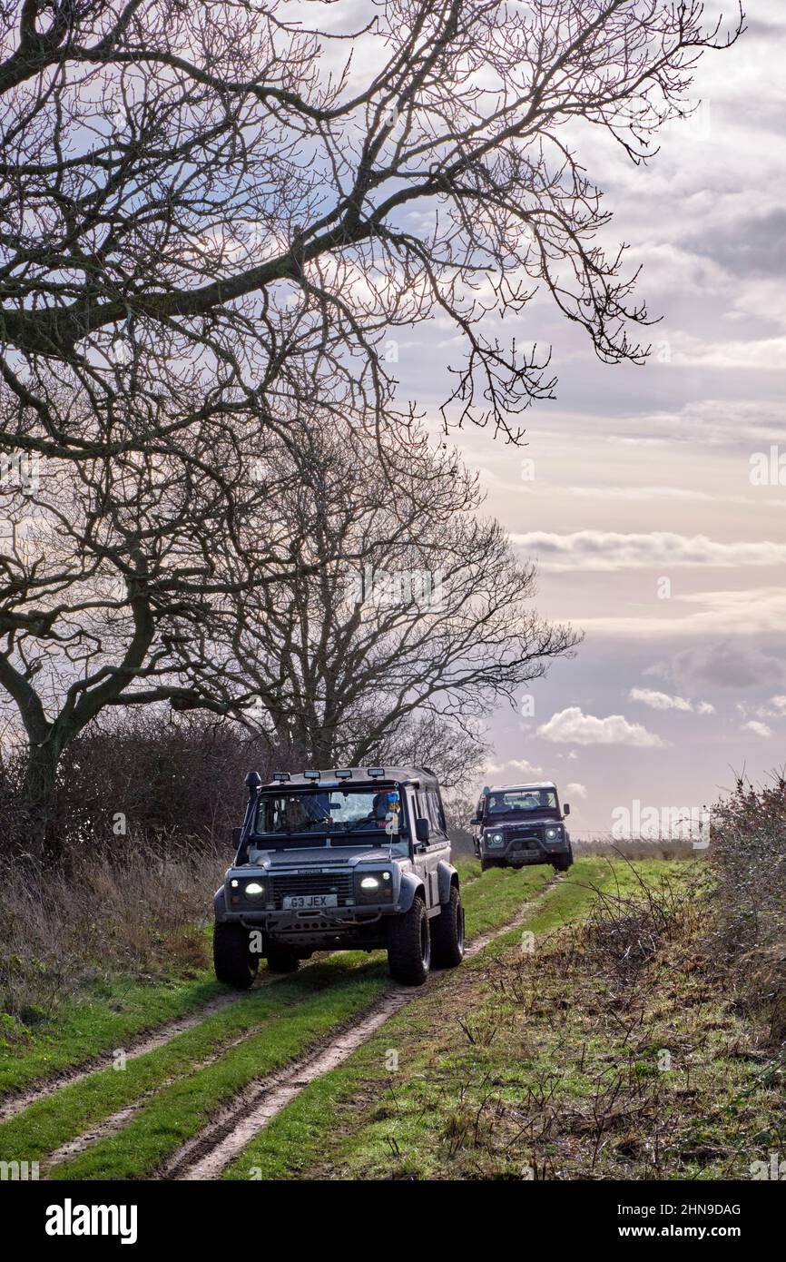 Land Rovers on the Peddars Way near Fring. Norfolk, England. Stock Photo