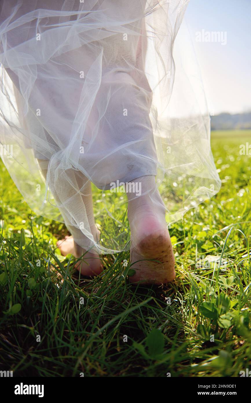 Walking barefoot grass asian hi-res stock photography and images - Alamy