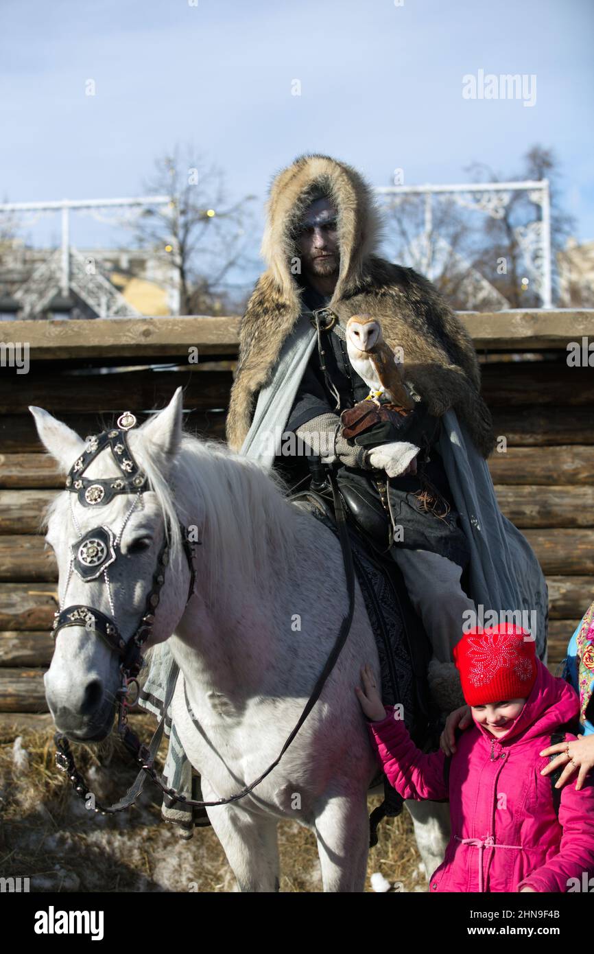 Costumed actors on the streets of Moscow. People with spears, weapons, archers, princes, guardsmen, масленица, парад костюмов, праздничное шествие, ко Stock Photo