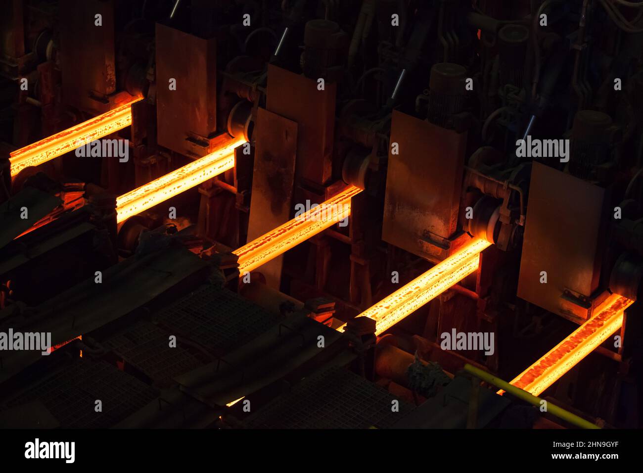 Manufacturing of mild steel square bar on continuous casting machine. Stock Photo