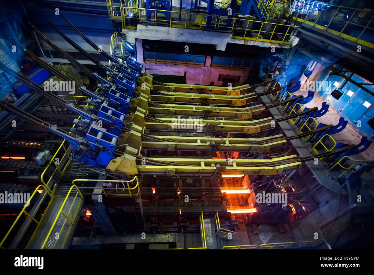 Manufacturing of mild steel square bar. View of continuous casting machine. Stock Photo