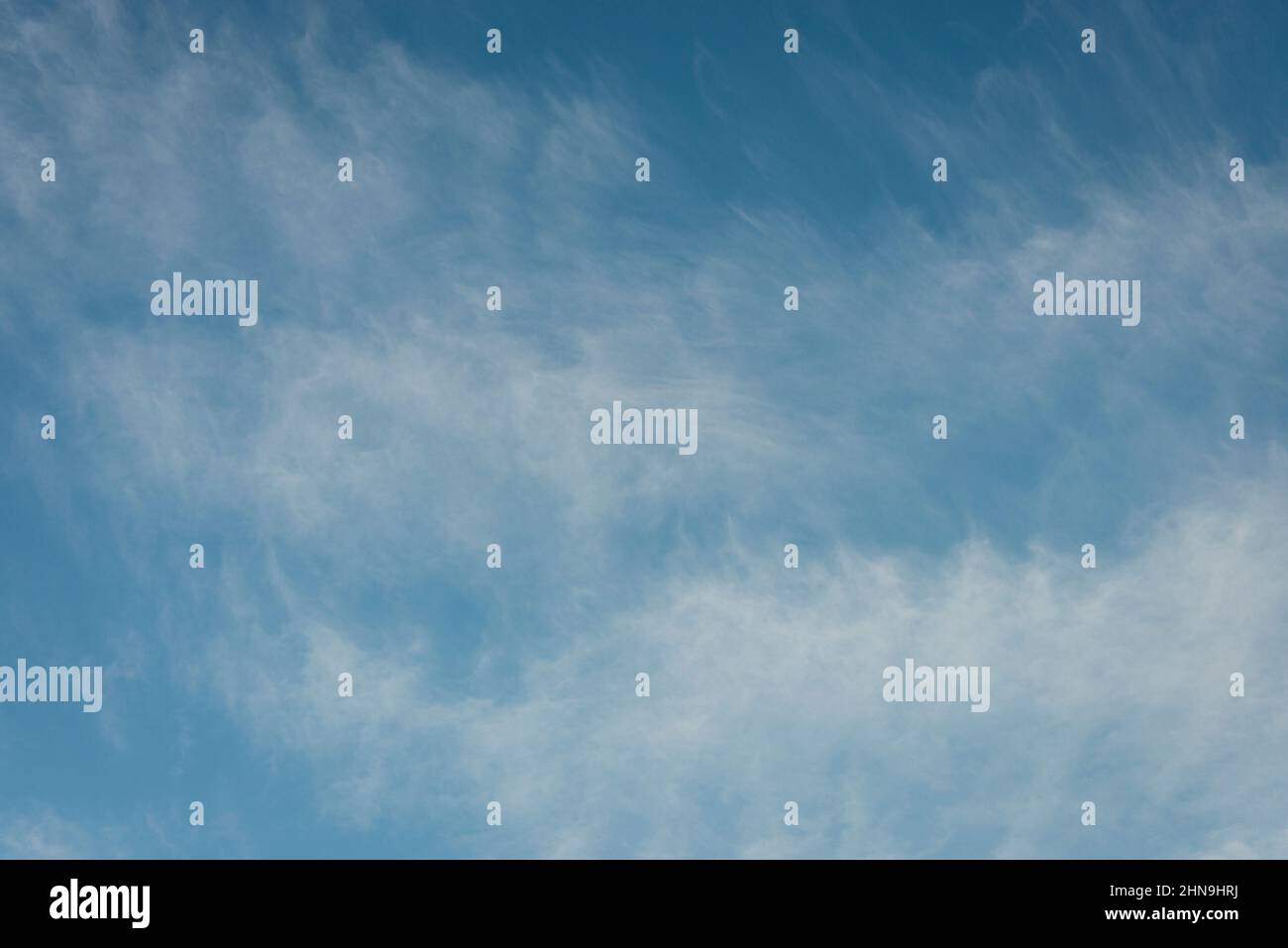 clouds against a blue sky, cirrus clouds. Stock Photo