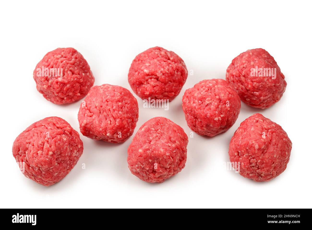 Raw meat balls isolated on white background. Stock Photo