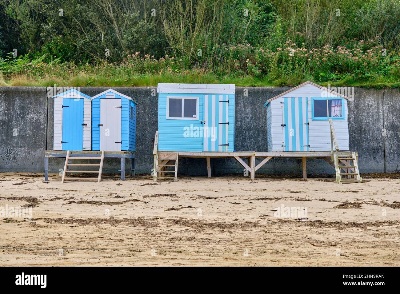 Colourful Beach Huts at Porth Nefyn, Wales Stock Photo