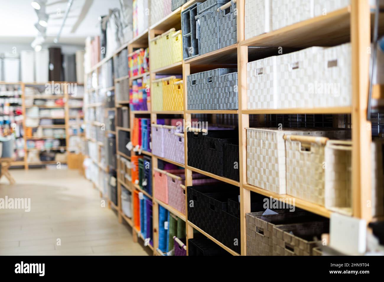 Hardware store shelves filled with boxes for linen closeup Stock Photo