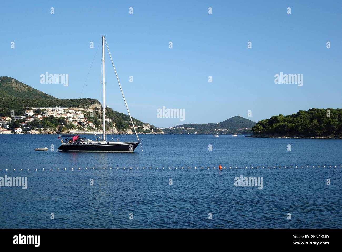 Boat moored in the picturesque Zaton Bay, Croatia. Stock Photo