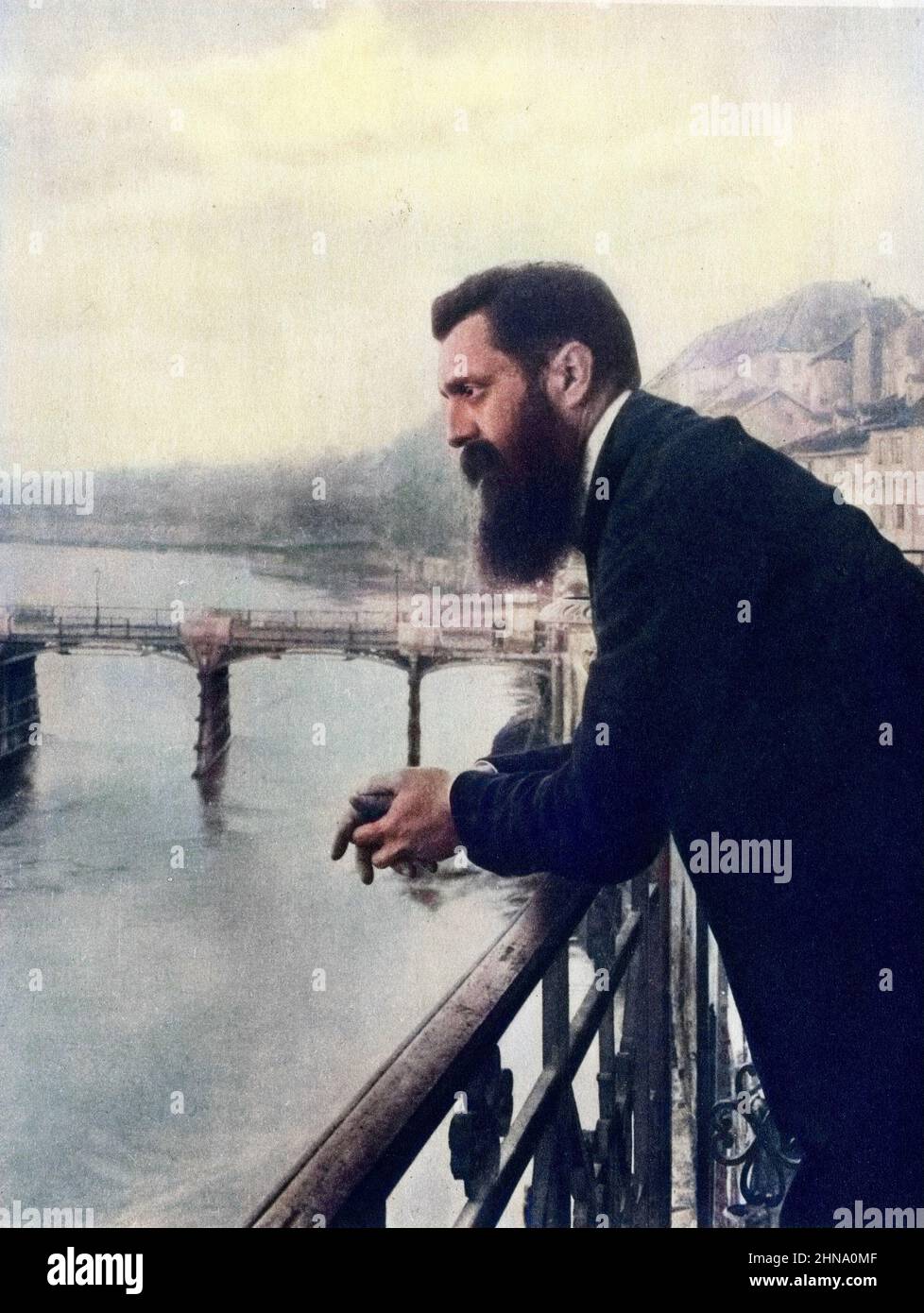Portrait of Theodor Herzl at the balcony of the hotel in Basel where he stayed during the zionistic congress overlooking the rhine river, Switzerland, Photograph, 1897 Stock Photo