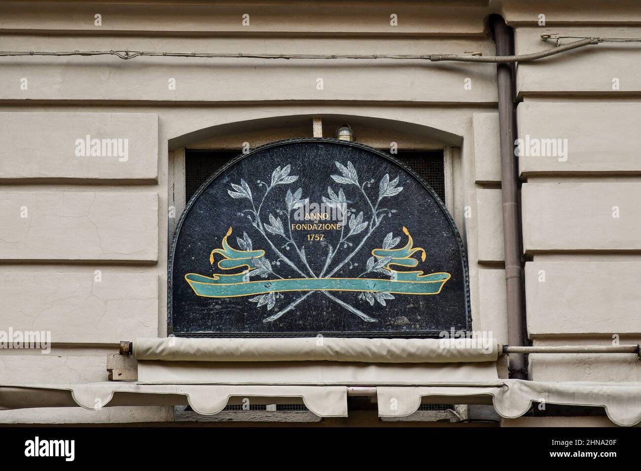 Close-up of the exterior of the historical Ristorante Del Cambio with an old sign which reports the opening year of the restaurant, 1757, Turin, Italy Stock Photo