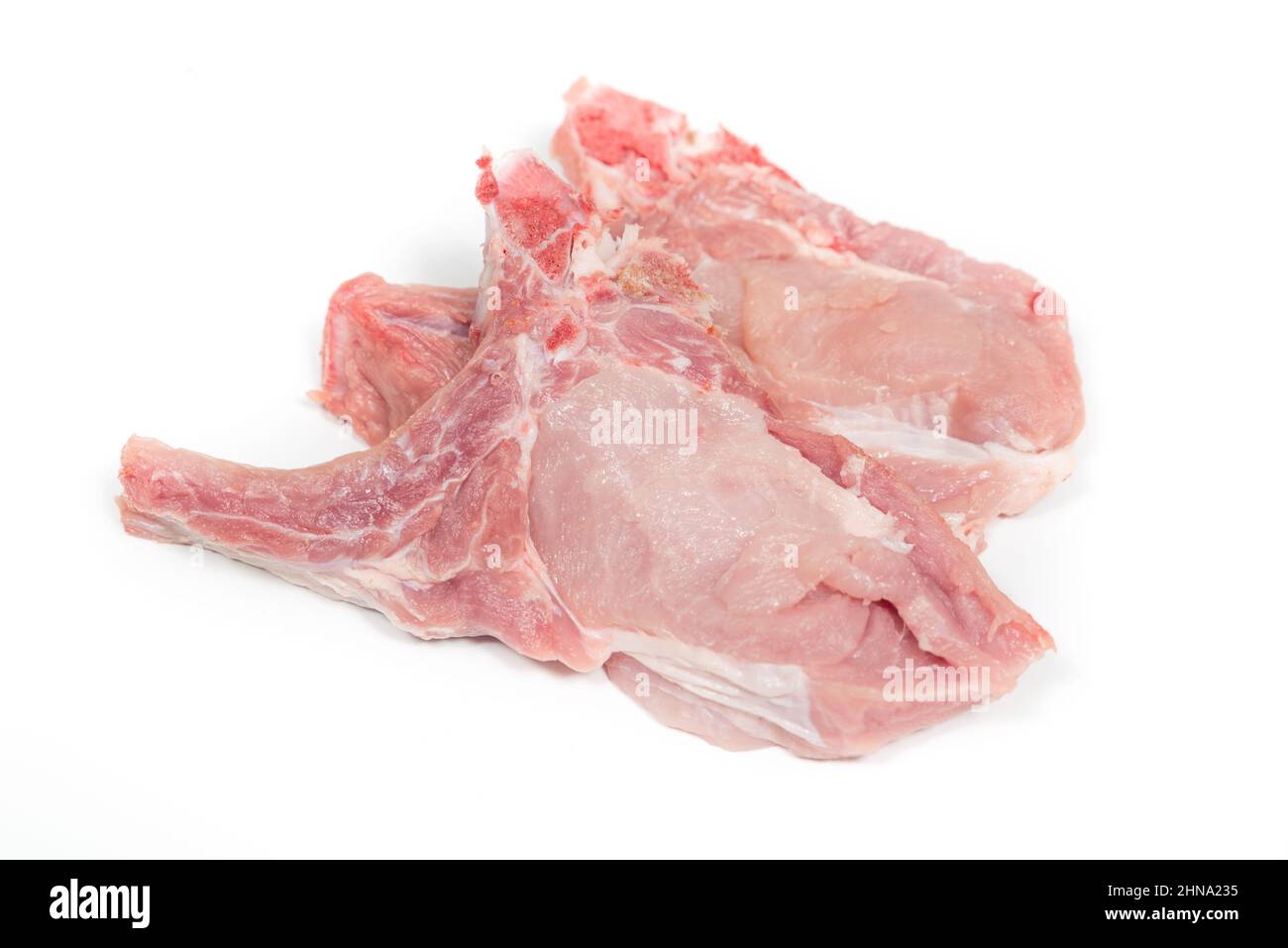 raw loin chops in a white background Stock Photo