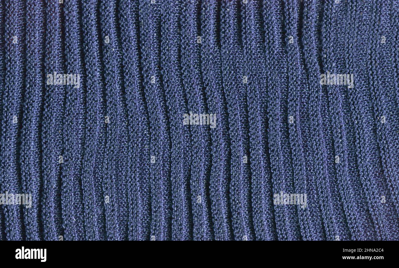 Knitted blue  texture surface close up. Background from softness blue  blanket. Stock Photo