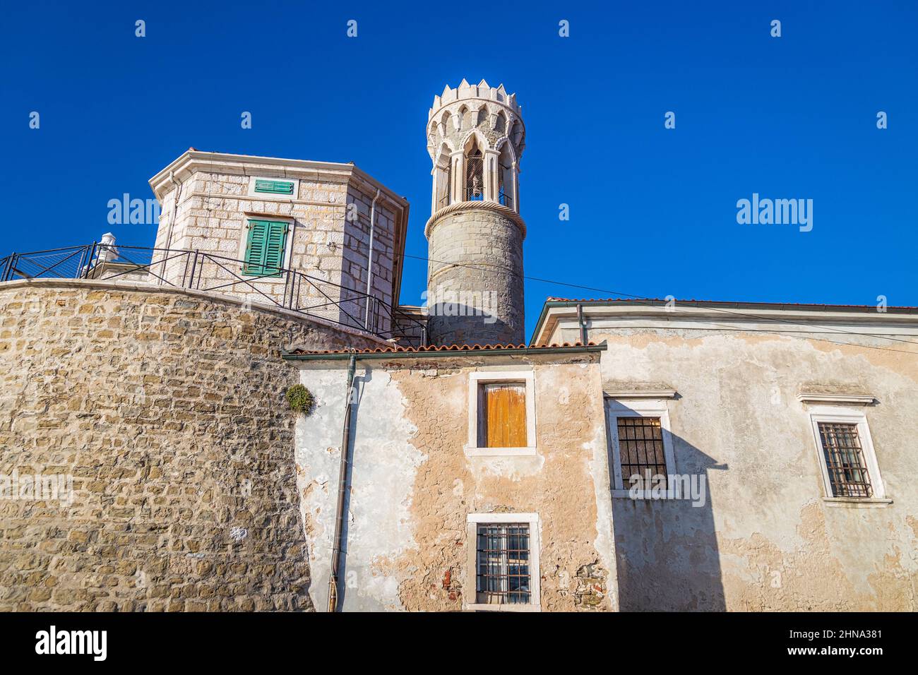 Lighthouse in the Piran town on Adriatic sea, one of major tourist attractions in Slovenia, Europe. Stock Photo