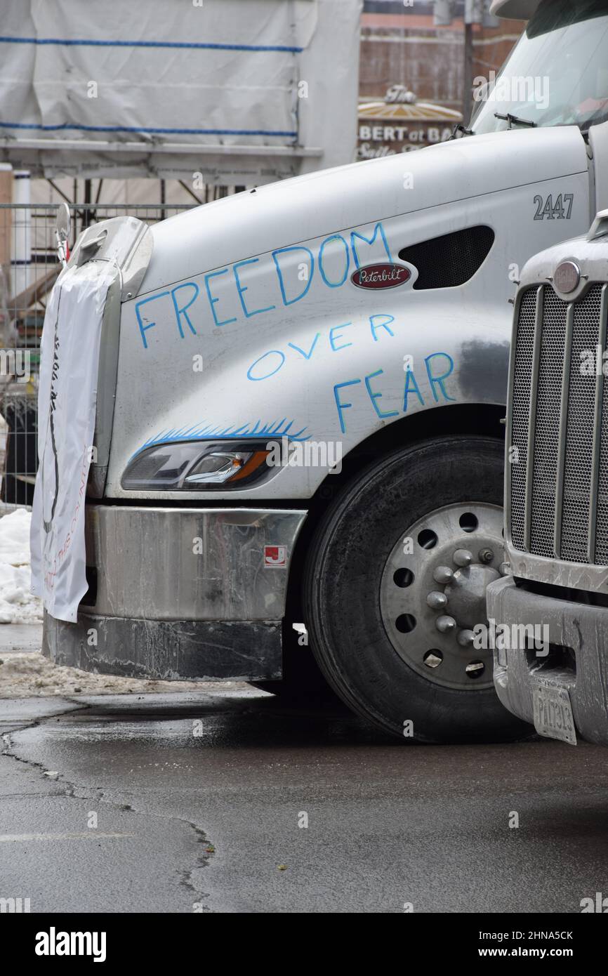 Freedom over fear hand written on semi-trailer blocking the street in downtown Ottawa Stock Photo