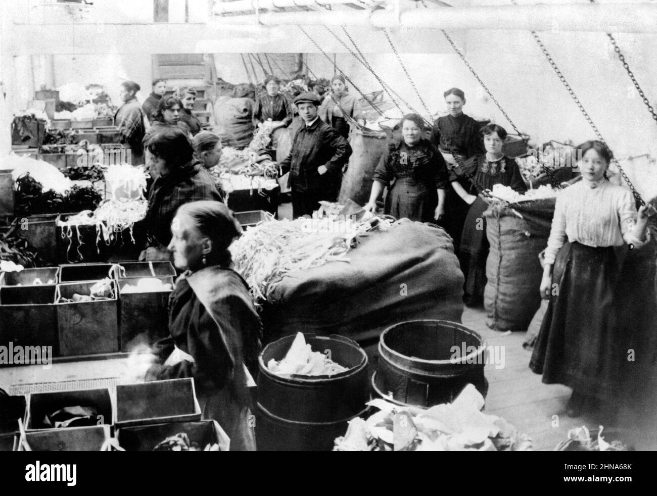 Victorian work, rag pickers sorting scrap textiles in Manchester factory Stock Photo