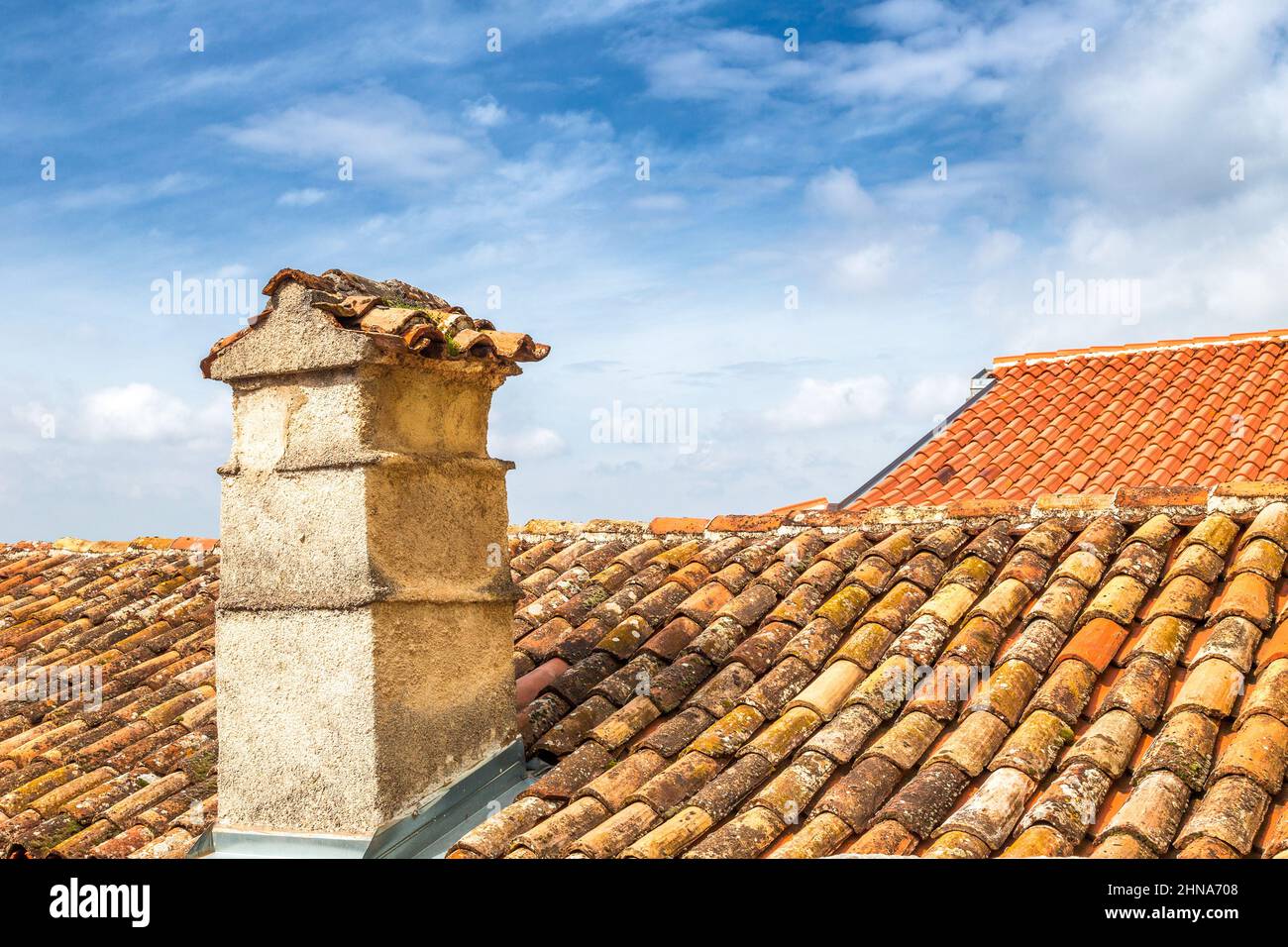 Red scarf roof wit a chimney on house in Istria, Croatia, Europe. Stock Photo