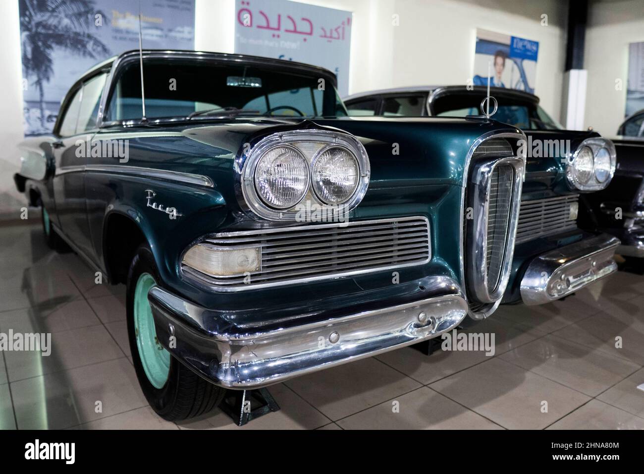 '7/31/2021 - Sharjah, UAE: 1958 Ford Edsel Pacer Blue Antique Classic Car teal view of bumper and head lights. Stock Photo