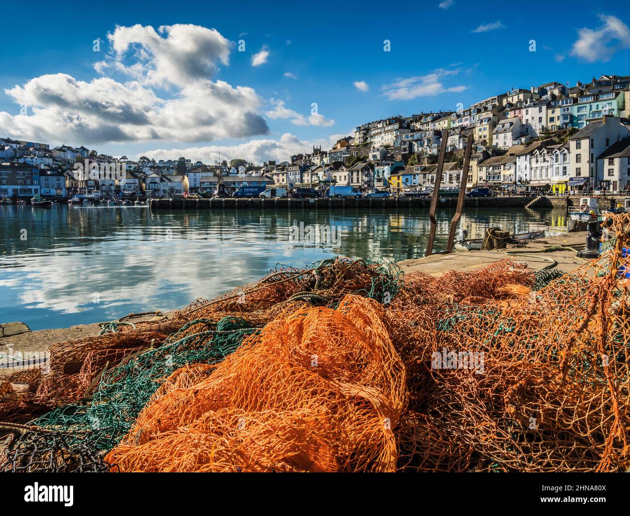 A sunny day in the fishing harbour of Brixham in south Devon. Stock Photo