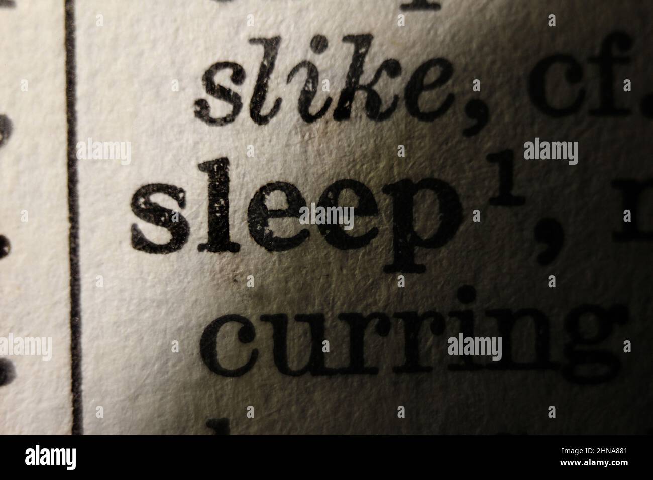 Definition of word sleep on dictionary page, closeup Stock Photo Alamy