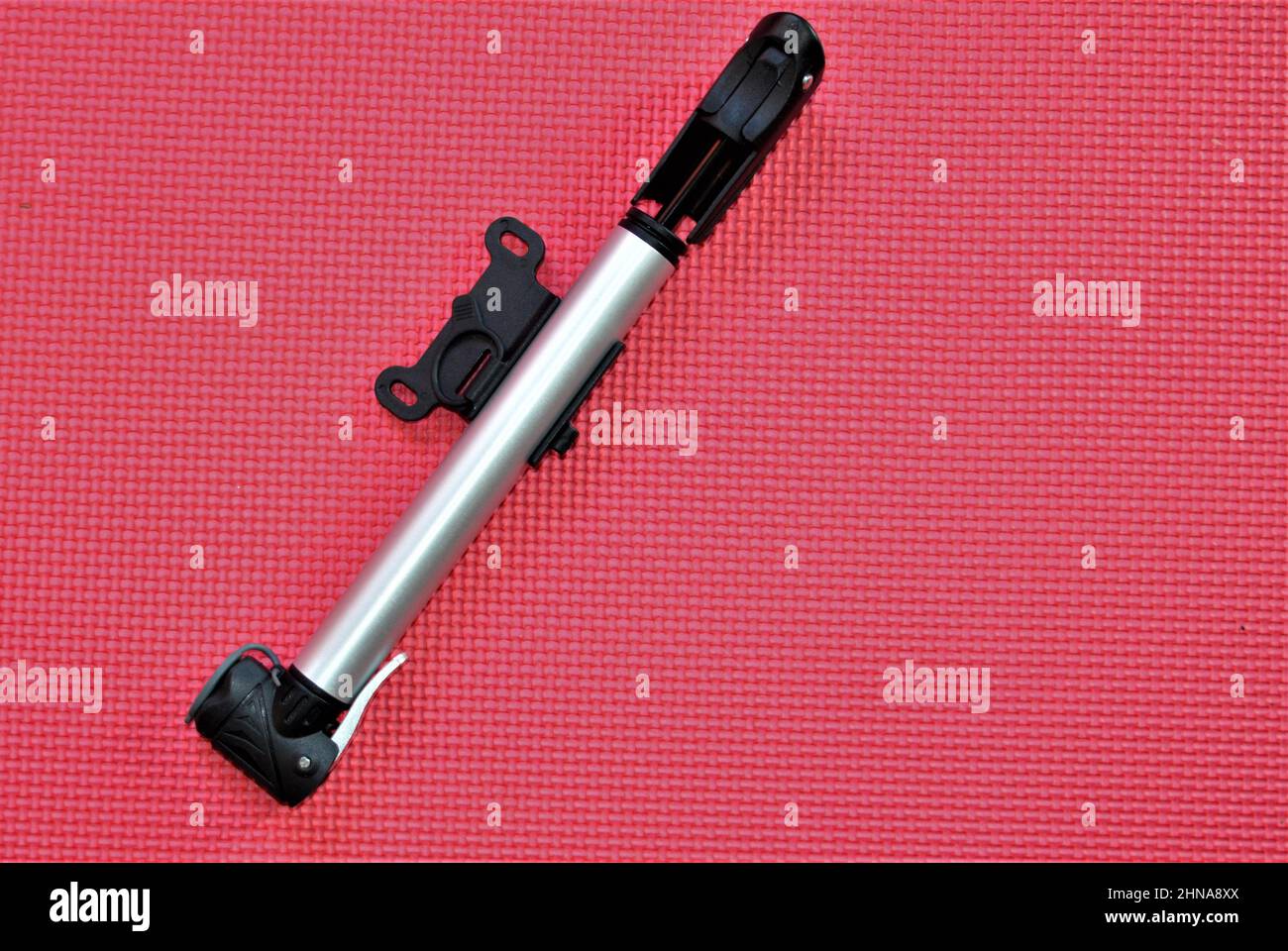 bicycle pump not large can be attached to the bicycle Stock Photo Alamy