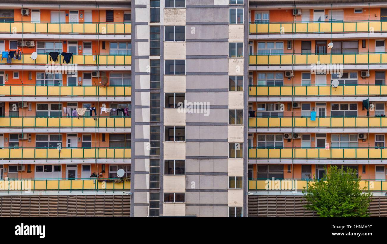 Facade of a old apartment block of flats with balconies. Stock Photo