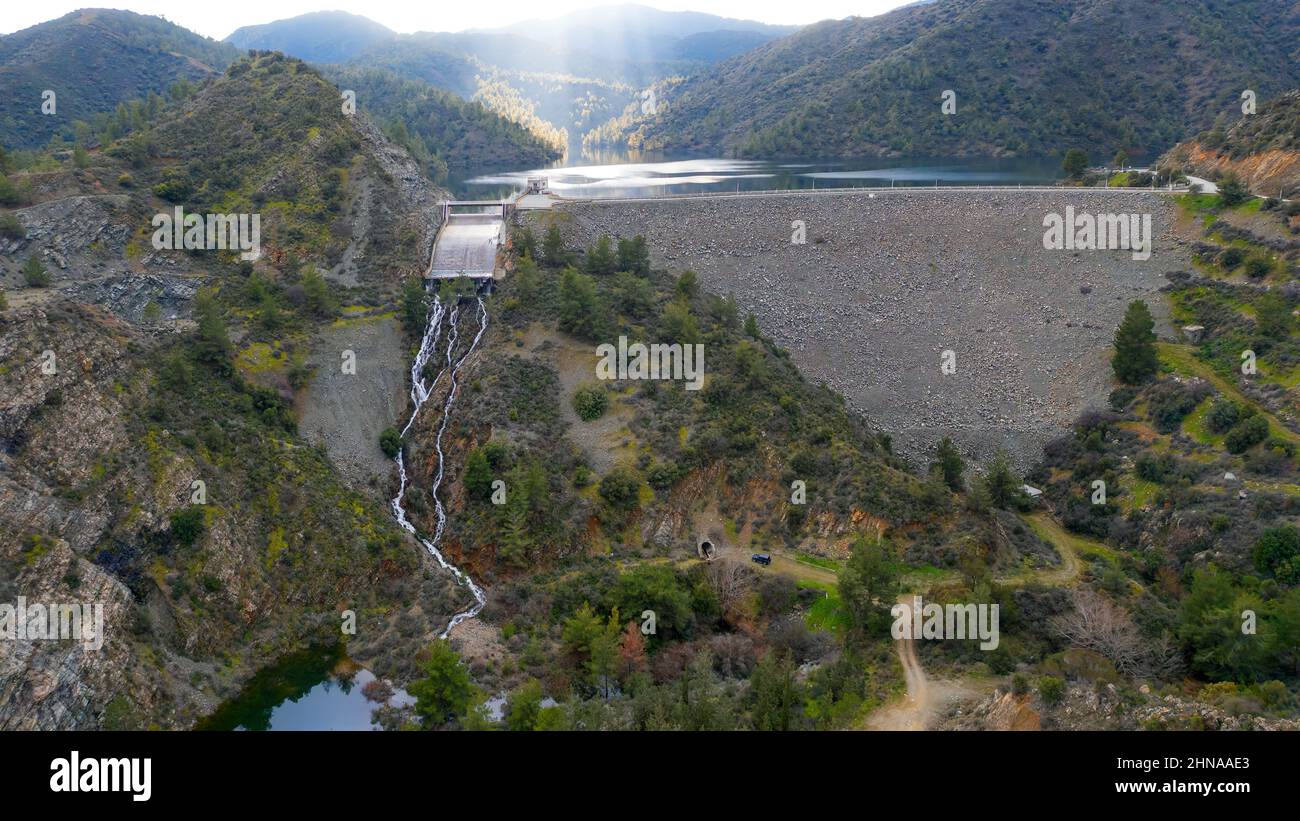 74 meters high Lefkara dam in Cyprus overflows after winter rains. Water storage is important in arid climate Stock Photo