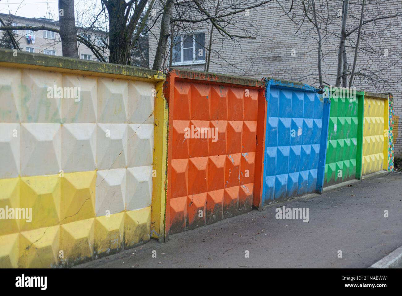 Background from bright blocks. Obstruction for pedestrians. Stock Photo
