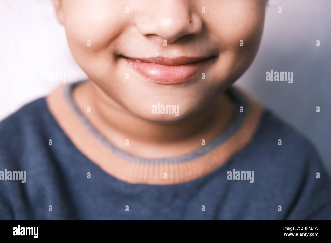 Portrait of child girl looking the camera and laughing Stock Photo - Alamy