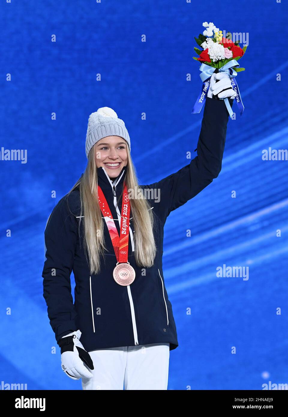 Zhangjiakou, China's Hebei Province. 15th Feb, 2022. Bronze medalist Kelly Sildaru of Estonia poses during the awarding ceremony of freestyle skiing women's freeski slopestyle at Zhangjiakou Medals Plaza of the Winter Olympics in Zhangjiakou, north China's Hebei Province, Feb. 15, 2022. Credit: Hu Huhu/Xinhua/Alamy Live News Stock Photo