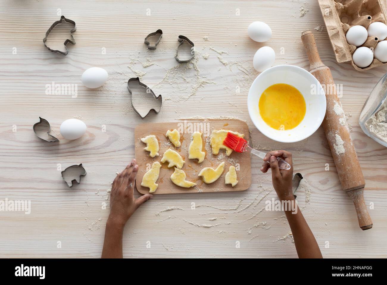 Unrecognizable black girl making cookies, top view Stock Photo