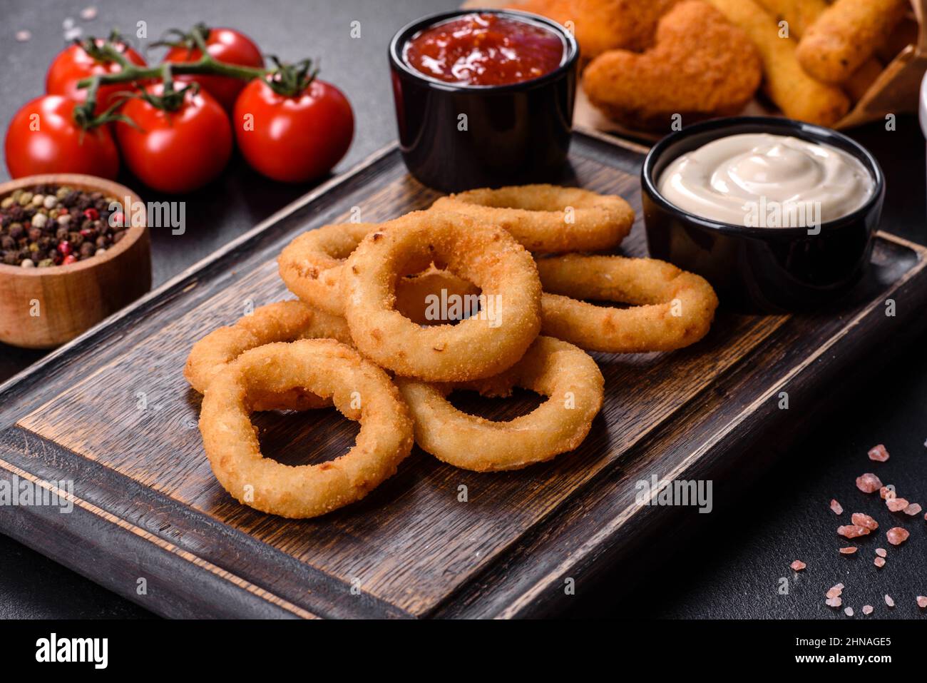 Delicious golden battered, breaded and deep fried crispy onion rings ...