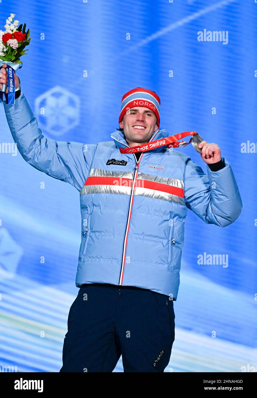 Beijing, China. 15th Feb, 2022. Silver medalist Mons Roisland of Norway  poses for a photo during the awarding ceremony of the men's snowboard big  air at the Beijing Medals Plaza of the